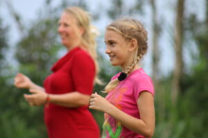 smiling child and adult