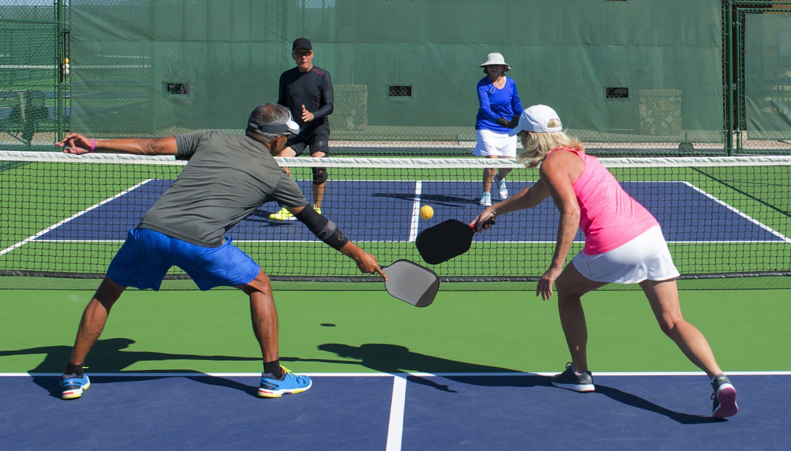 pickleball-mixed-doubles-action