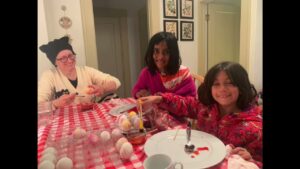 kids coloring easter eggs