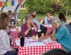 World Cafe small group talking closeup